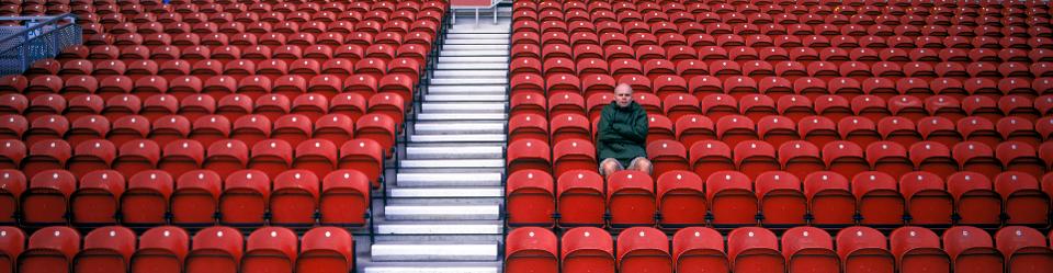 Man in Empty Stadium