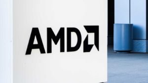 Image of the Advanced Micro Devices (AMD) logo outside of a corporate building