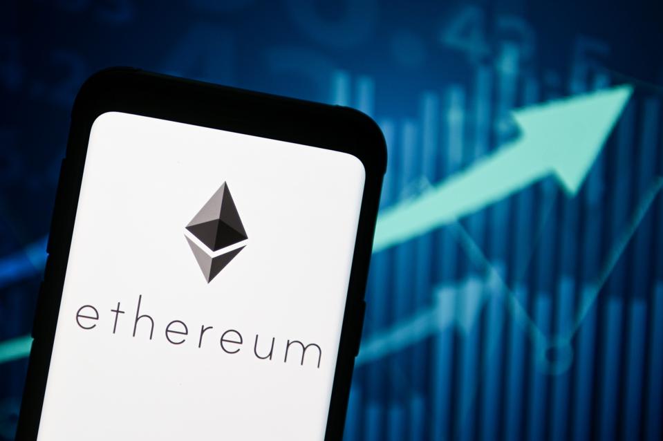 In this photo illustration an Ethereum logo seen displayed...
